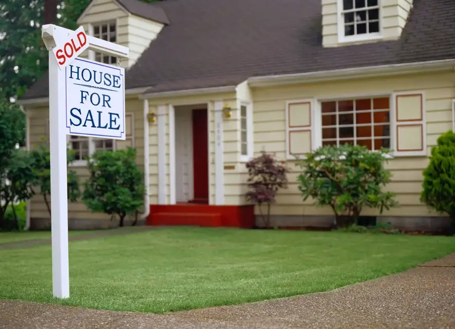 For Sale Name Plate outside a house